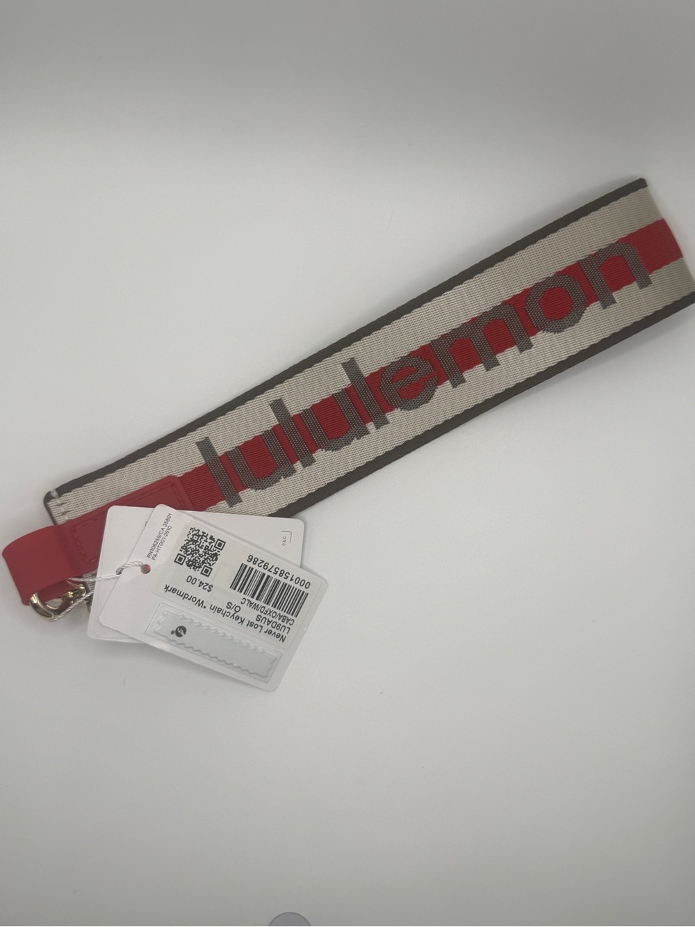 NWT Lululemon Never Lost KeychainCoconut Ivory Oxford Red Walnut Crunch